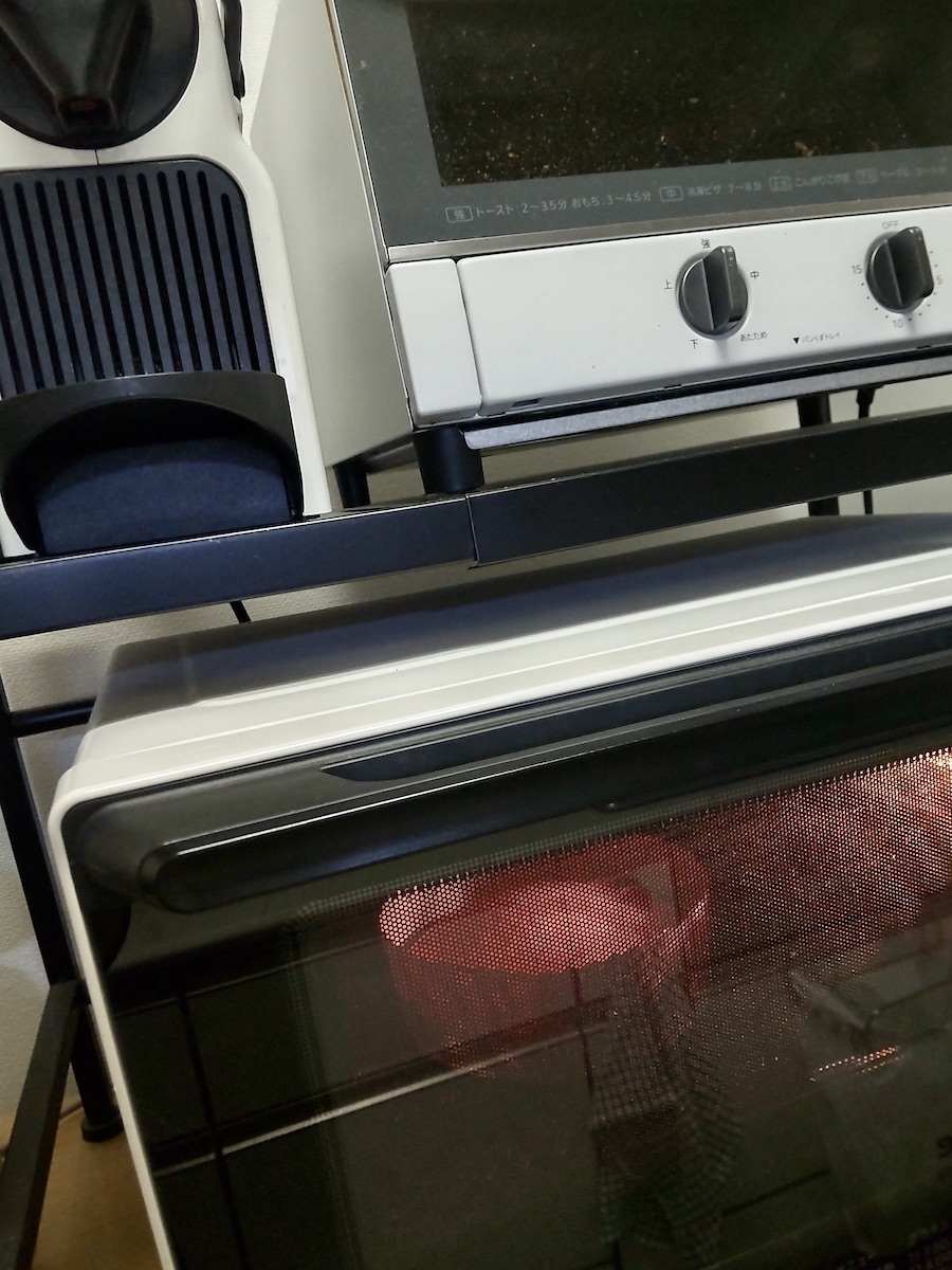 A pound cake baking in the oven