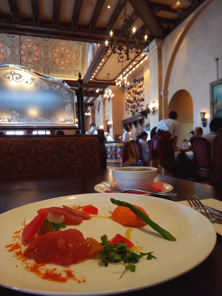 A close-up of an antipasto misto plate at an indoor table in Ristorante di Canaletto