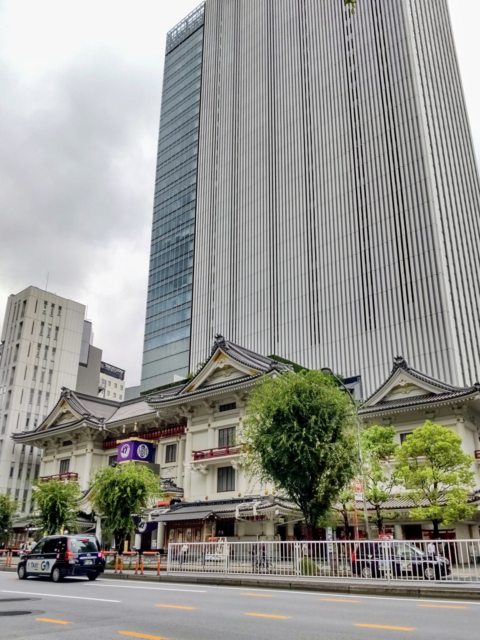 A distant view of the Kabukiza Theater and the modern Kabukiza Tower behind it in Ginza, Tokyo