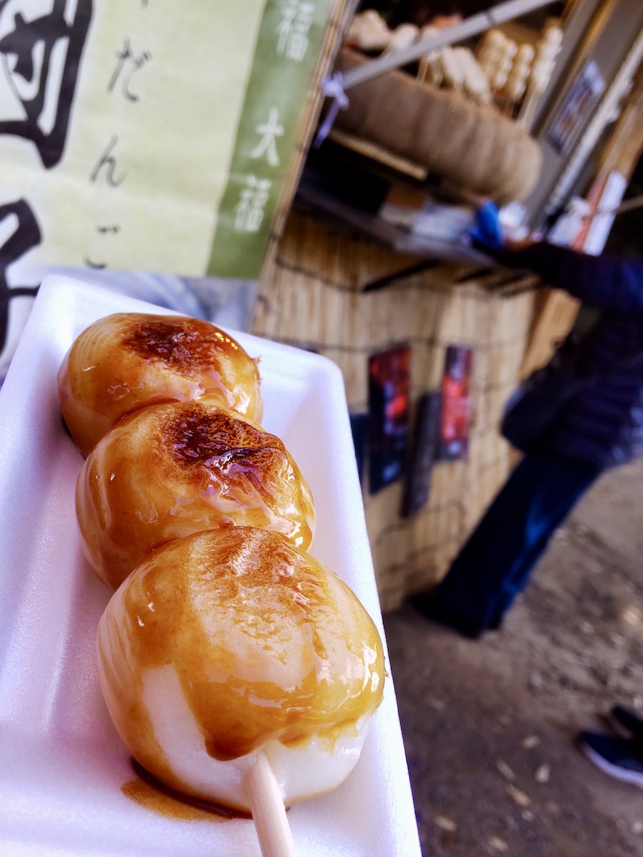 Skewered dango drizzled with soy sauce glaze
