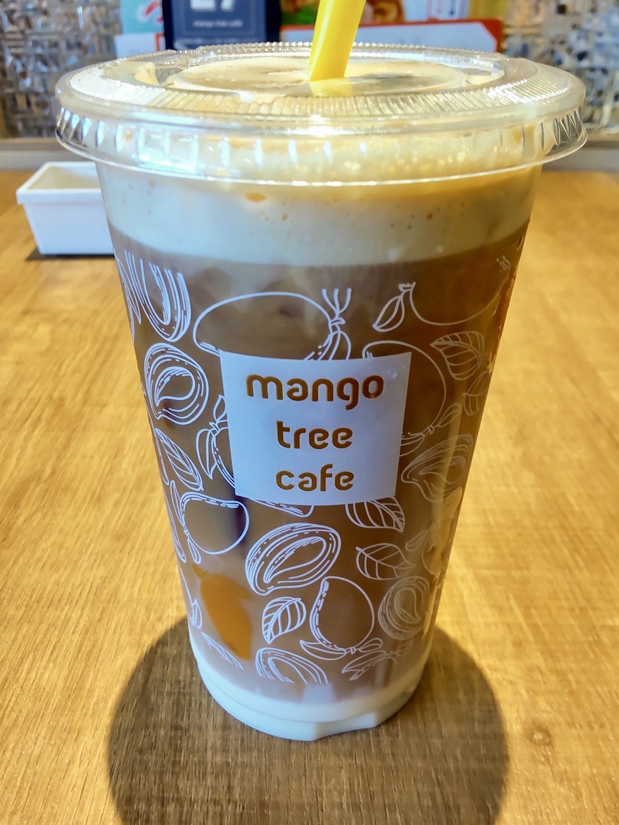 Mango Tree's iced milk tea, with condensed milk accumulated at the bottom