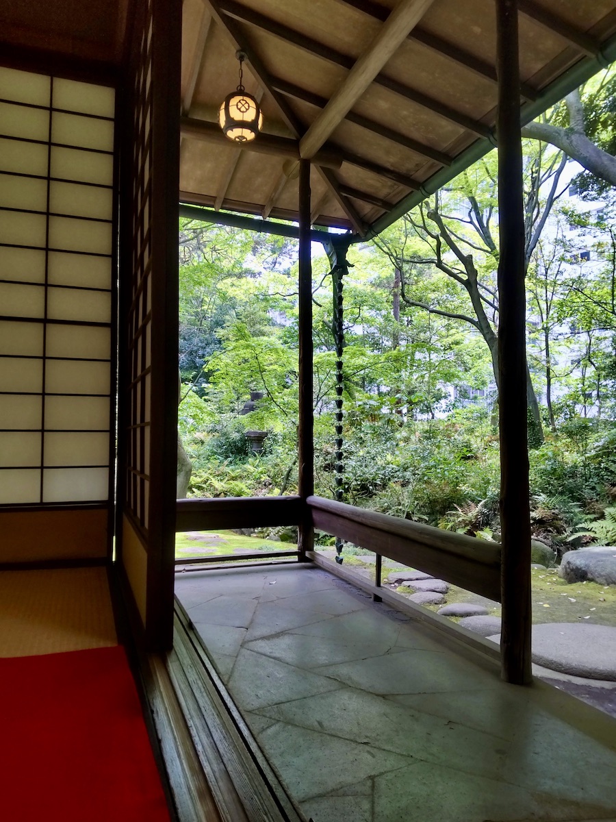 Charming lamps hanging above a passageway surrounding a Japanese tearoom