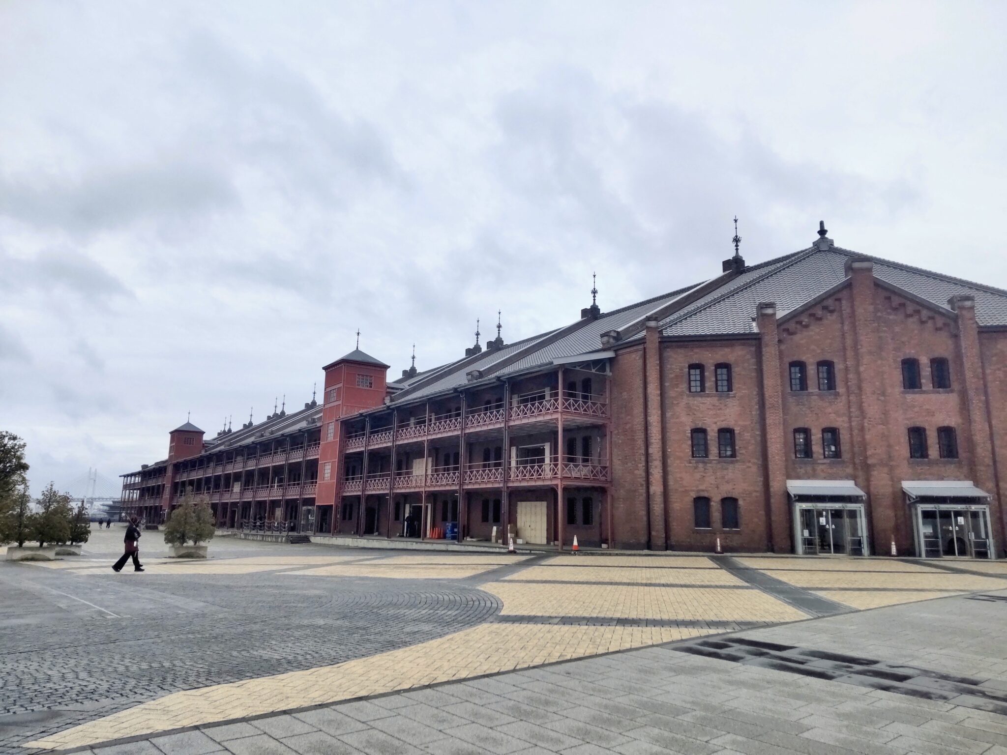 A massive warehouse built with heavy and solid red bricks