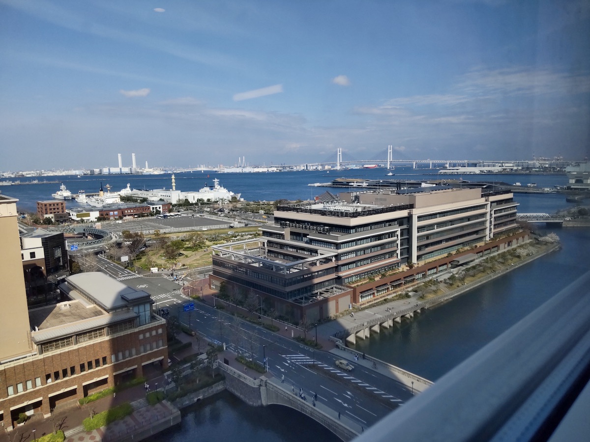 Harbor buildings and the sea with the Yokohama Bay Bridge