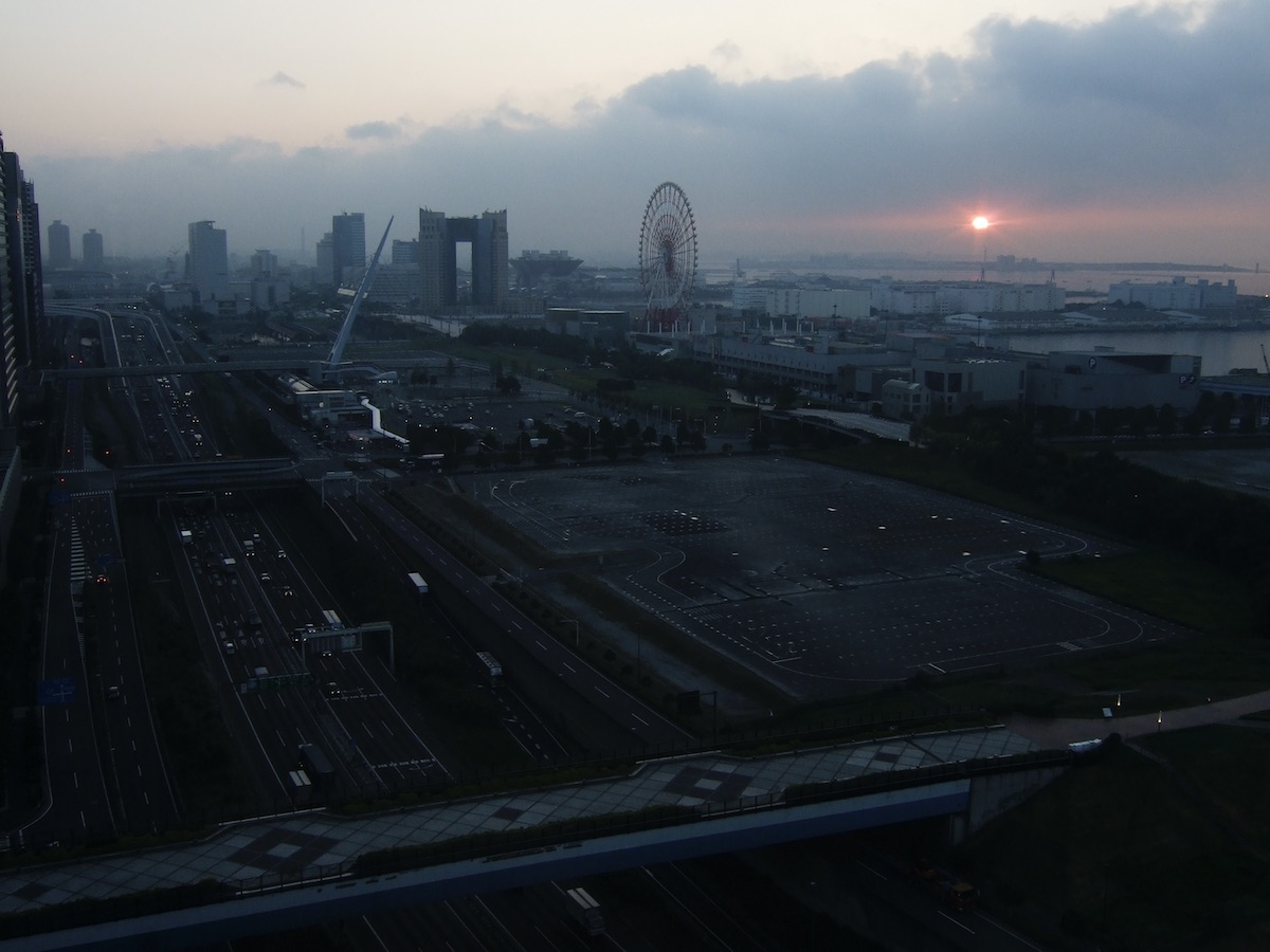 High angle view of Odaiba city structure and giant ferris wheel at dusk